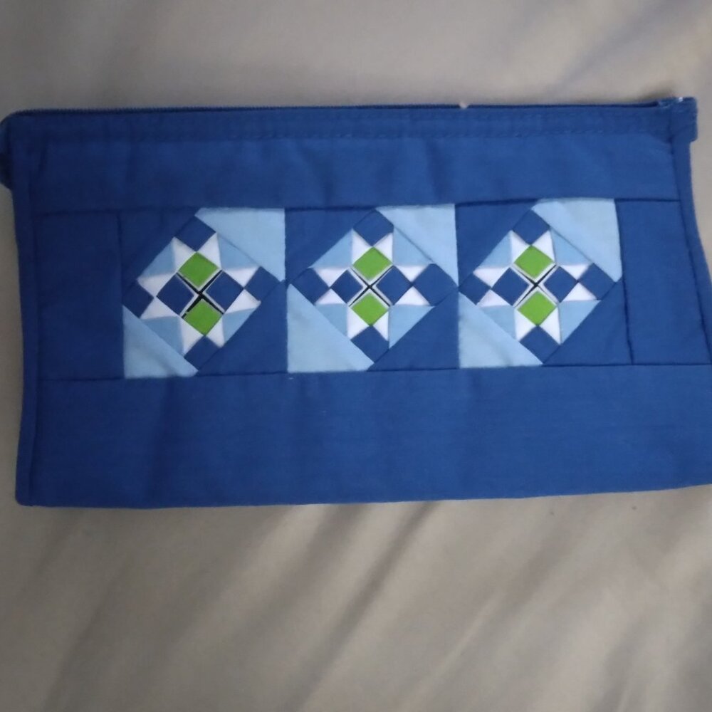 Blue with pattern travel makeup or other item bag.